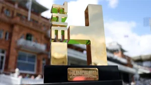 The Hundred Women’s Championship trophy displayed at a cricket stadium.