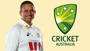 Usman Khawaja in Australian Test cricket uniform standing beside the Cricket Australia logo on a light yellow background