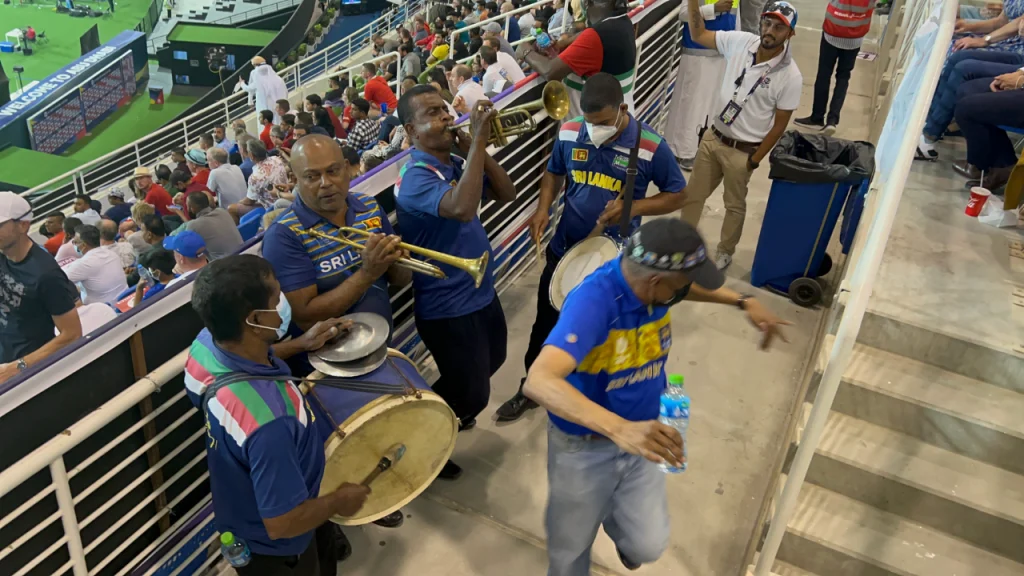 Crickbuster’s local Sri Lankan band performing live in the stands at Abu Dhabi stadium during the ICC Men’s T20 World Cup 2021, energizing the crowd with music