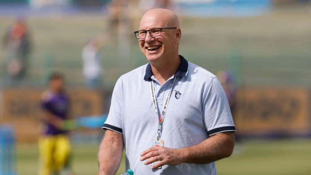 ILT20 CEO David White smiling on the field during a DP World International League T20 event