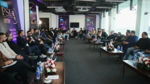 Officials, franchise representatives, and media personnel attend the HBL PSL 2026 players auction workshop in a formal conference room setup.