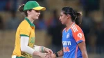 South Africa captain Laura Wolvaardt and India captain Harmanpreet Kaur shake hands after a women's international cricket match in 2026.
