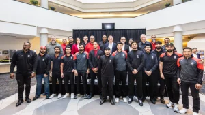 Brampton Mayor Patrick Brown, Cricket Canada GM Ingleton Liburd, national team players, and officials posing for a group photo at a cricket event.
