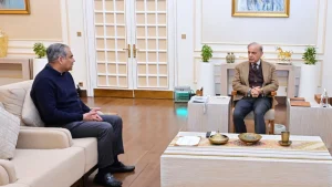 PCB Chairman Mohsin Naqvi meets with Prime Minister of Pakistan Mian Muhammad Shehbaz Sharif in an official setting to discuss cricket affairs.