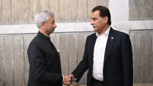India’s External Affairs Minister Dr. S. Jaishankar and Pakistan’s National Assembly Speaker Ayaz Sadiq shaking hands during a diplomatic meeting