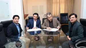 Sumair Ahmad Syed and Dr. Ali Adnan Zaidi of PCB with Aly Rana and Ali Altaf of tapmad during a partnership signing meeting.