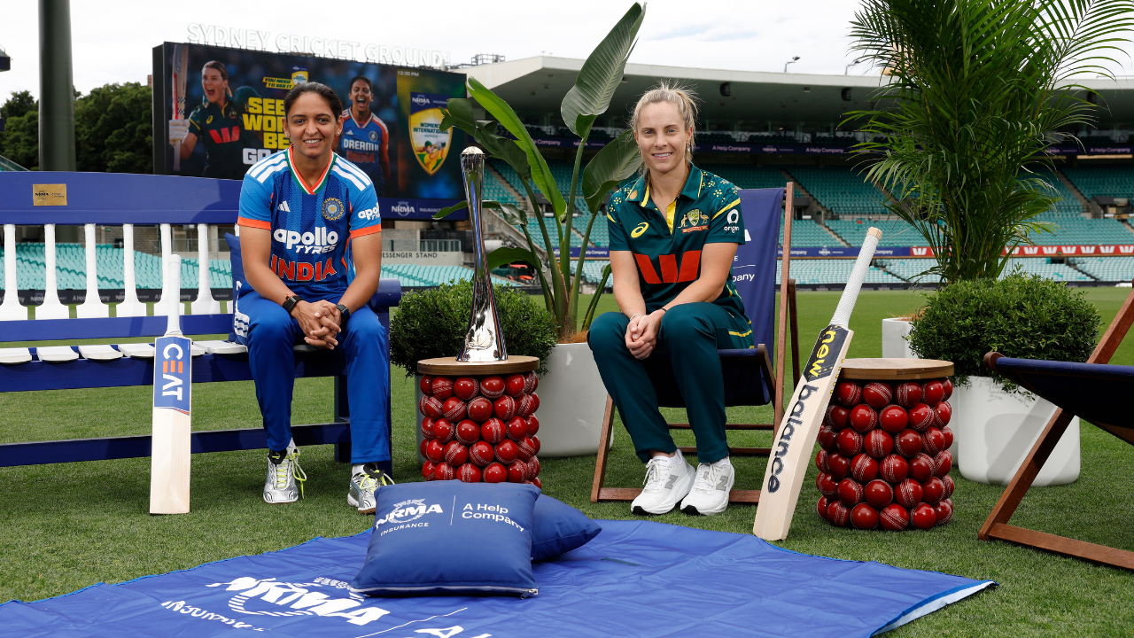 Australia T20 captain Sophie Molineux and India captain Harmanpreet Kaur pose with the trophy at Sydney Cricket Ground ahead of a women’s T20 series.