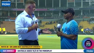 Post-match interview on the field after Sri Lanka defeated Australia by eight wickets in a Cricket World Cup match, with presenters holding microphones inside the stadium.
