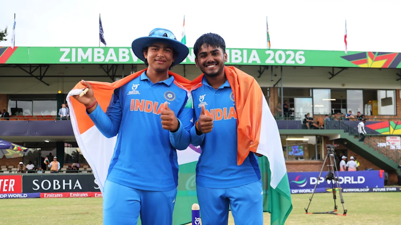 India U19 cricketers Vaibhav Sooryavanshi and Ayush Mhatre celebrate with the national flag during the U19 World Cup 2026 in Zimbabwe