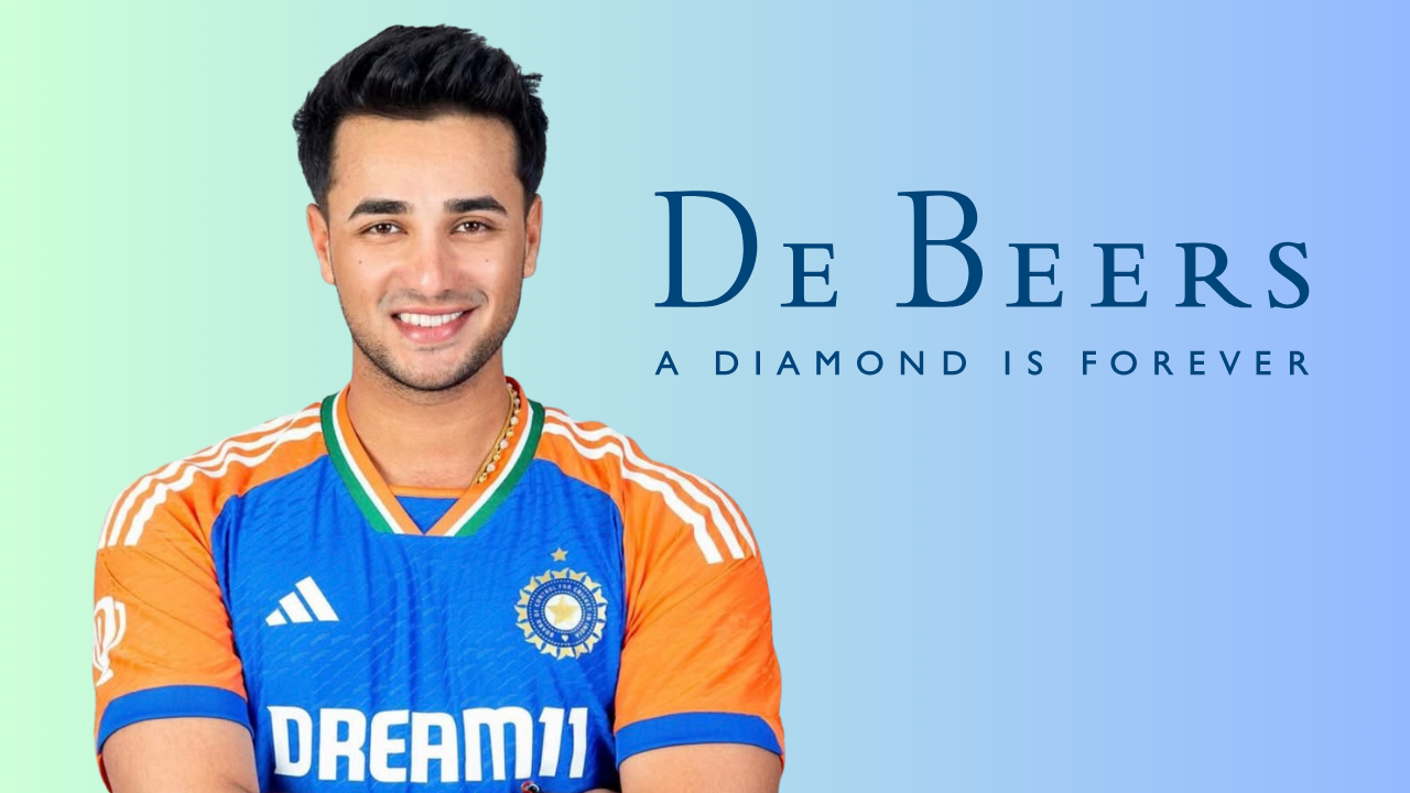 Indian cricketer Abhishek Sharma in India jersey alongside the De Beers “A Diamond Is Forever” brand logo.