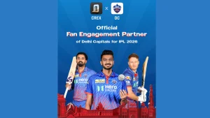 CREX announced as official fan engagement partner of Delhi Capitals for IPL 2026 with players in team jerseys holding cricket bats on blue promotional background