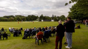 Spectators watching a cricket match at a local ground as Cricket Scotland explores venues for a potential ICC T20 World Cup feasibility study.