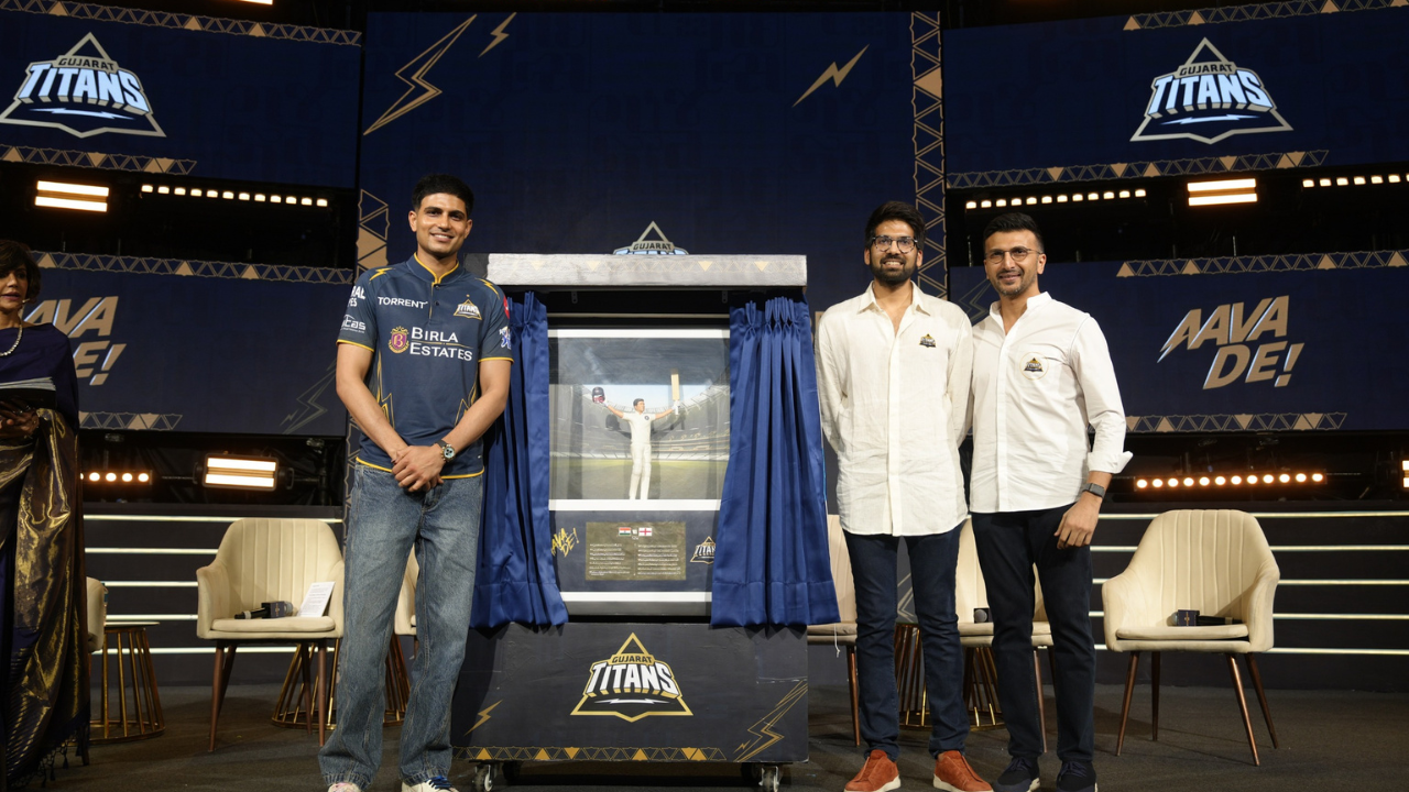 Gujarat Titans Season Launch 2026 Shubharambh event with players unveiling commemorative display on stage