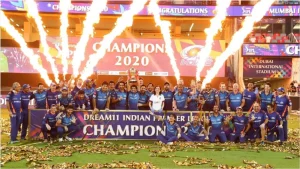 Mumbai Indians players celebrating IPL 2020 championship victory with trophy and fireworks at Dubai International Stadium