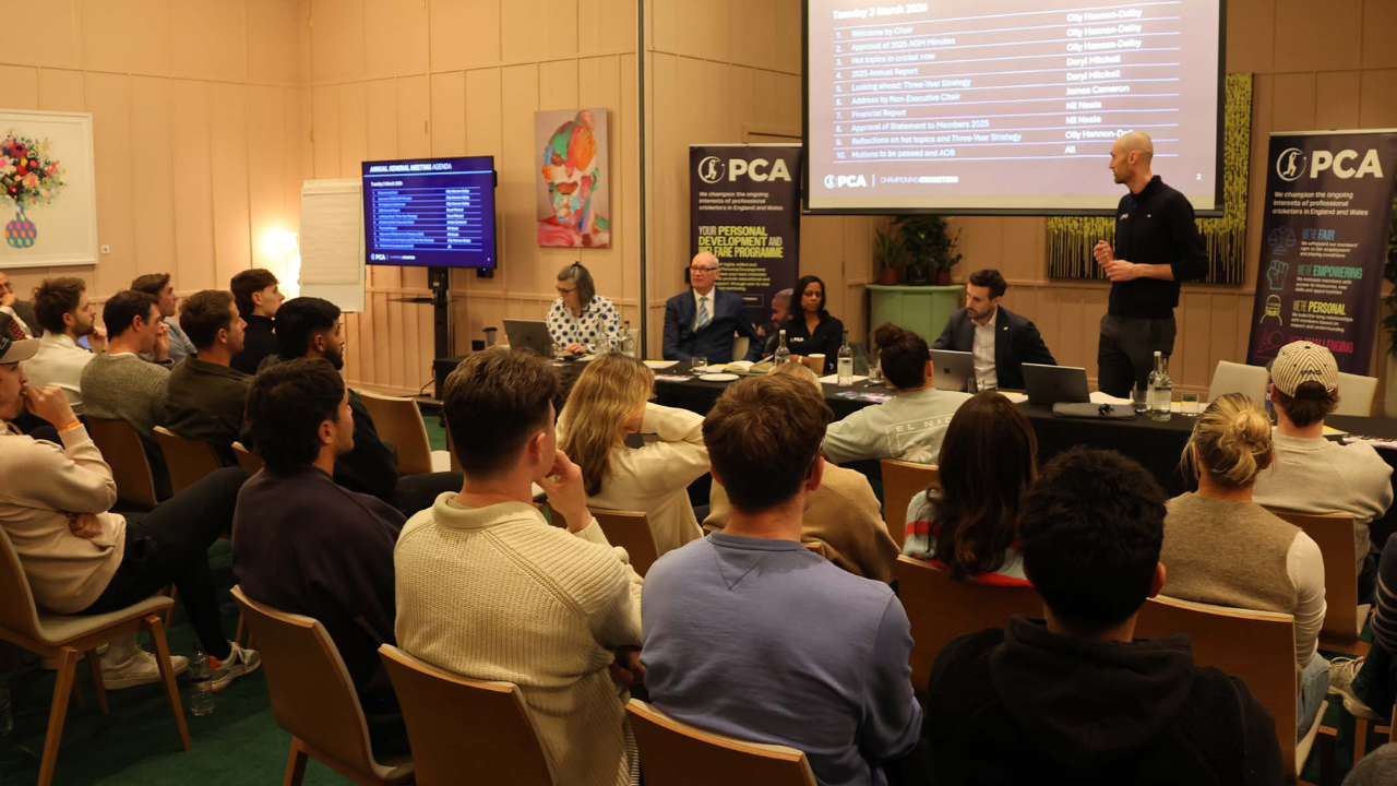 PCA Players’ Committee panel addressing members during the Professional Cricketers’ Association Annual General Meeting (AGM) with attendees seated in the conference room.