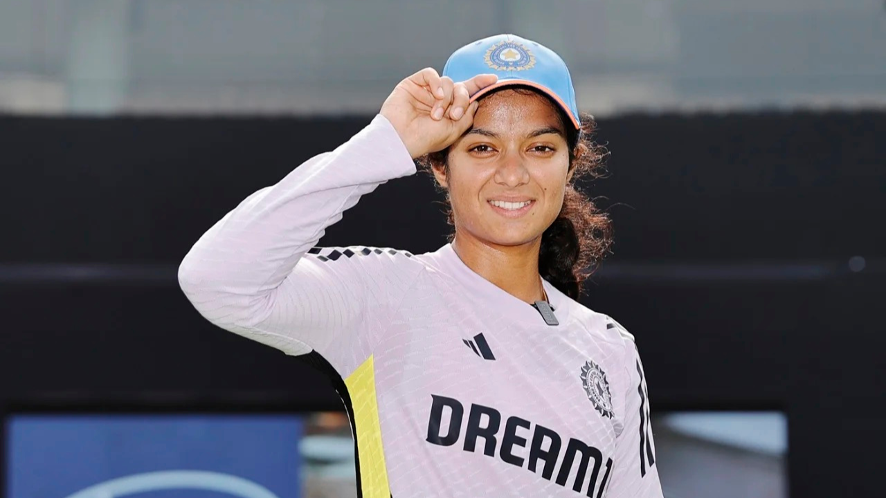 India women’s cricketer Pratika Rawal wearing an India cap and training jersey.