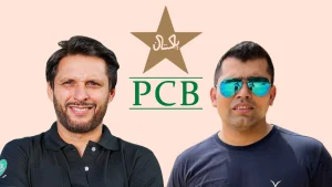 Shahid Afridi and Kamran Akmal with Pakistan Cricket Board PCB logo in background