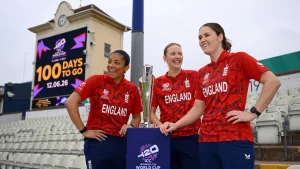 Sophia Dunkley, Lauren Filer and Nat Sciver-Brunt pose with the ICC Women’s T20 World Cup trophy at Edgbaston during the 100 days to go event for the 2026 tournament.