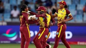 West Indies women’s cricket team players celebrate after taking a wicket during an international match at the stadium.