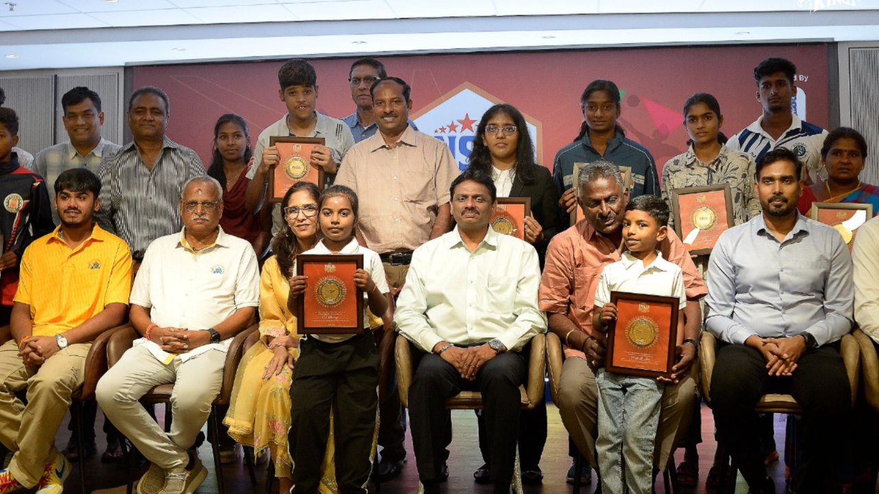 Award winners and officials pose with plaques at the Chennai Super Kings and Tamil Nadu Sports Journalists’ Association Awards and Scholarships 2026 ceremony.