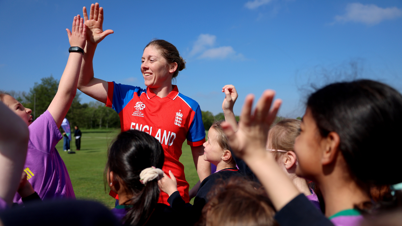 England captain Heather Knight high-fives children during Schools Cricket Day event marking 50 days to go until the ICC Women’s T20 World Cup.
