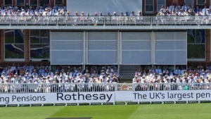 Crowd seated in the pavilion stands at Lord’s Cricket Ground during a cricket match in London