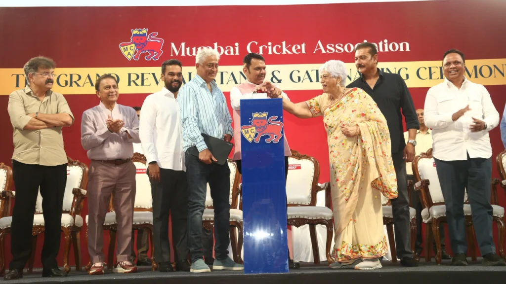 Mumbai Cricket Association stage event featuring Devendra Fadnavis, Sunil Gavaskar, Ravi Shastri, Ashish Shelar and Ajinkya Naik during an official ceremony.