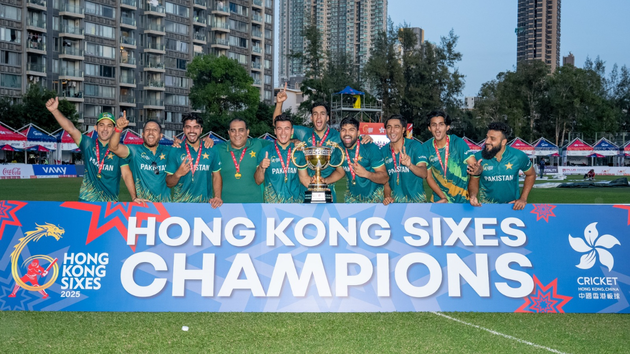 Pakistan cricket team celebrating Hong Kong Sixes 2025 title with trophy and champions banner