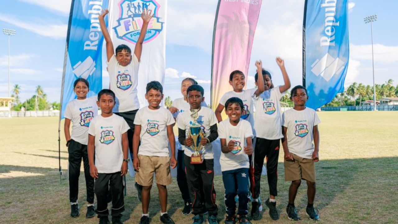 Children celebrate with trophy at Republic Bank and Cricket West Indies Five for Fun primary schools cricket programme event 2026
