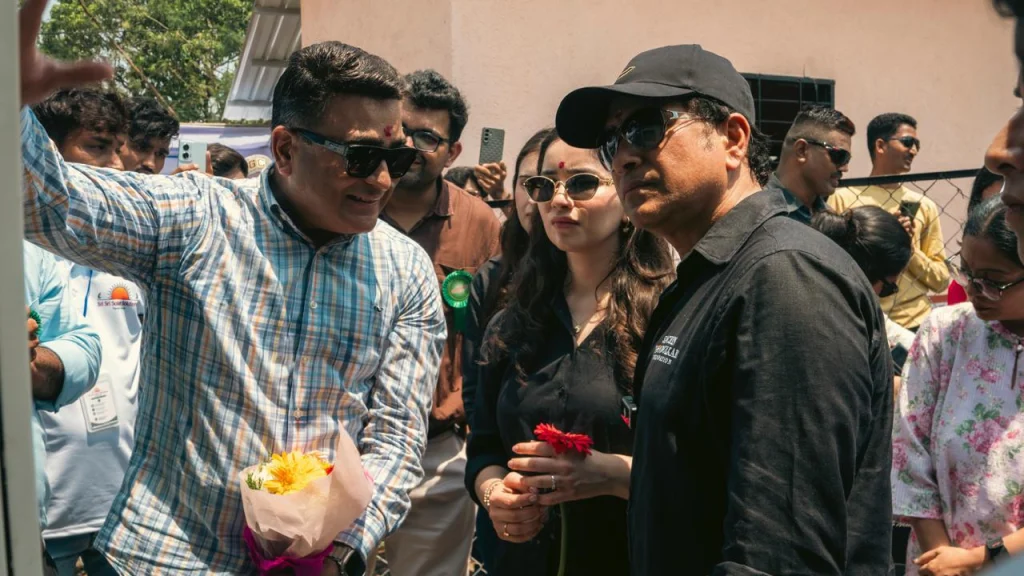 Sachin Tendulkar and Anjali Tendulkar interact with locals during visit to Guhir village in Maharashtra