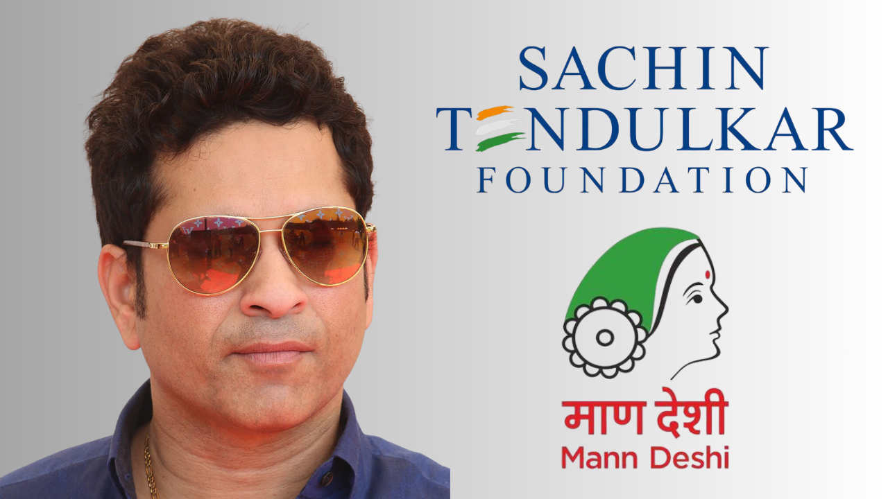 Sachin Tendulkar with Mann Deshi Foundation and Sachin Tendulkar Foundation logos on background.