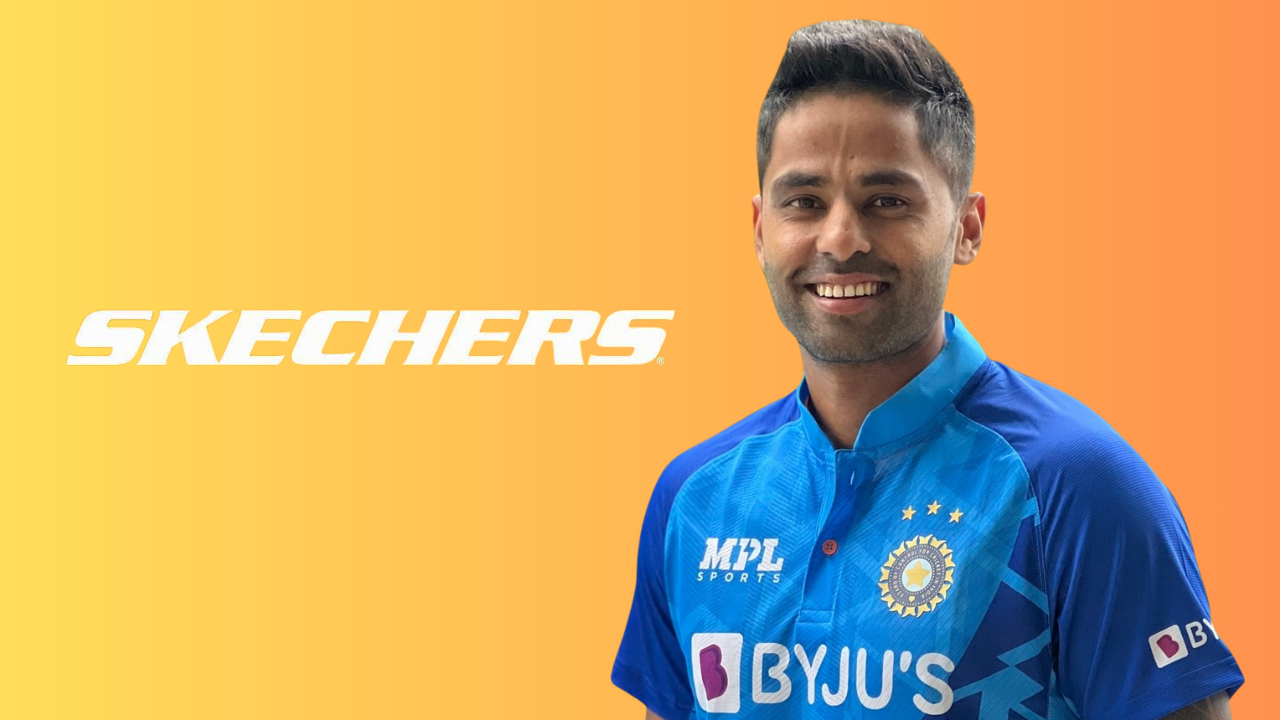 Indian cricketer Suryakumar Yadav in India team jersey with Skechers logo on orange background.