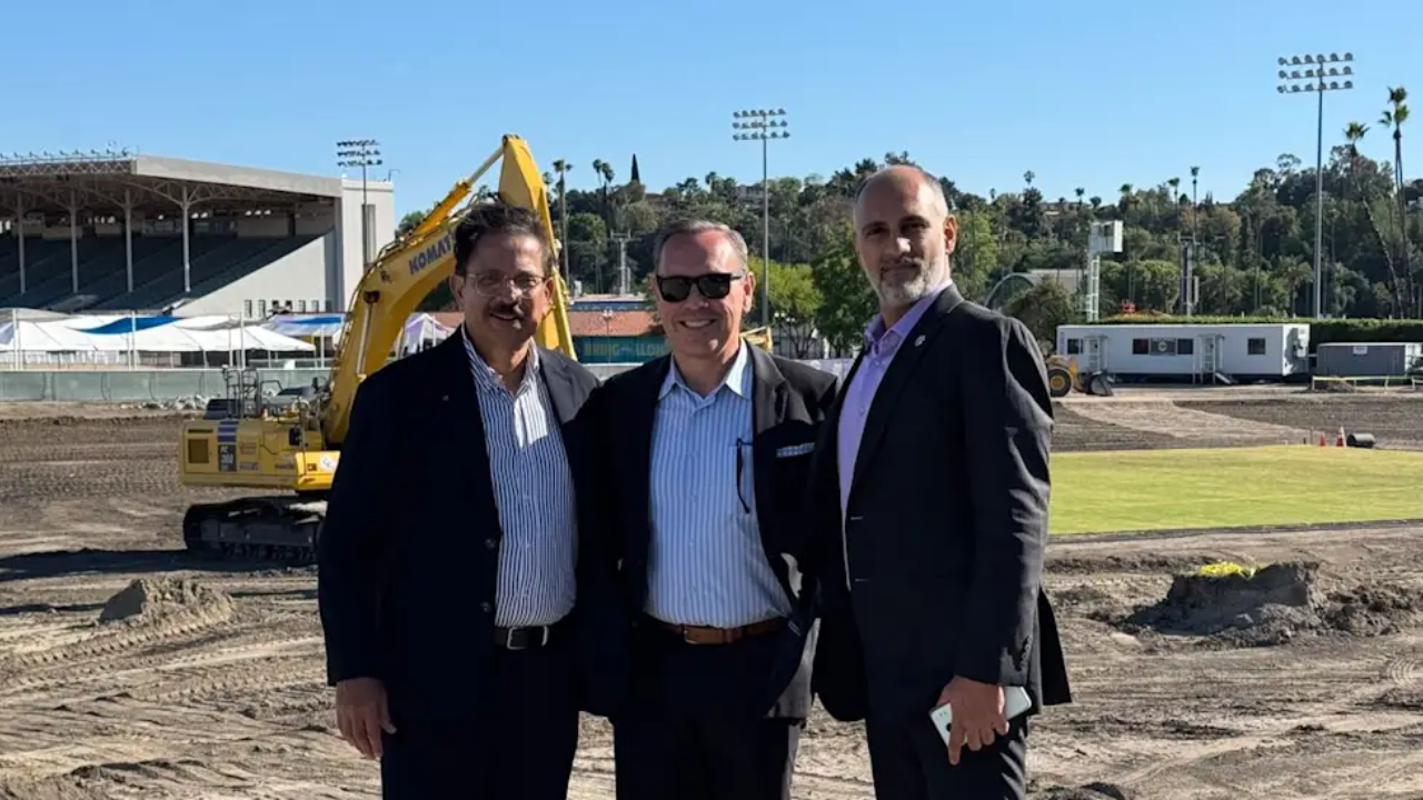 Venky Mysoore and Sanjog Gupta with officials at Los Angeles Knight Riders stadium site in Pomona, Los Angeles County during construction.