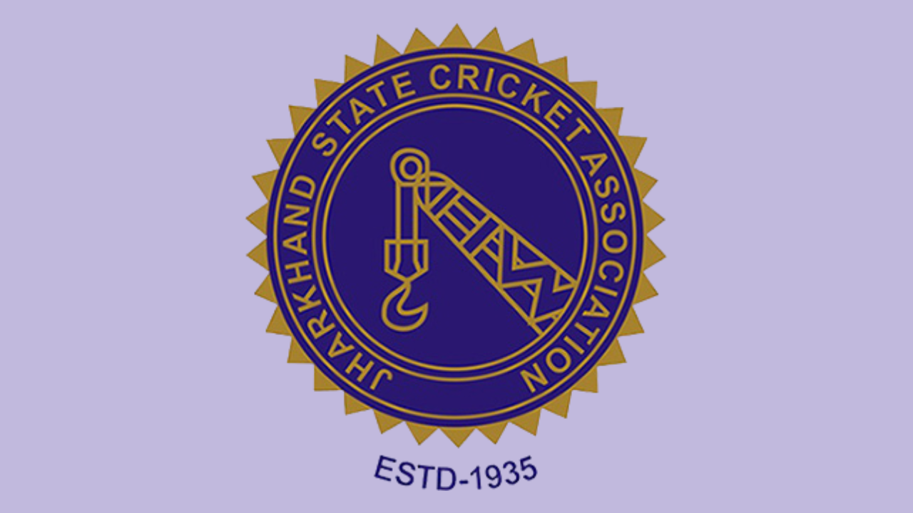 Jharkhand State Cricket Association logo featuring crane symbol with ESTD 1935 text on a blue and gold emblem background