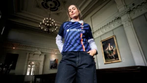 Model wearing the new London Spirit cricket jersey supplied by Nike during the official kit launch in an elegant historic venue.