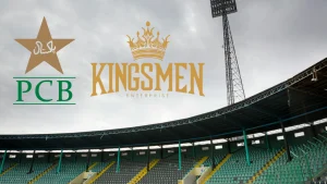 Pakistan Cricket Board (PCB) and Kingsmen Enterprise logos displayed over a cricket stadium background under cloudy skies.