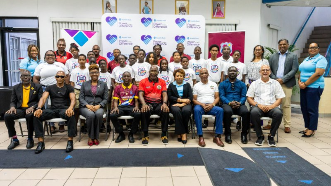 Participants and organizers of Republic Bank’s Five for Fun Cricket programme gathered for a group photo during a youth cricket development event.