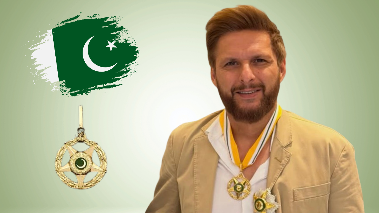 Former Pakistan cricket captain Shahid Afridi wearing the Hilal-e-Imtiaz award medal beside the Pakistani flag.