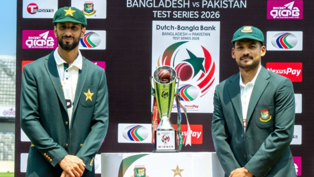 Shan Masood and Najmul Hossain Shanto pose beside the Bangladesh vs Pakistan Test Series 2026 trophy during the official presentation ceremony.