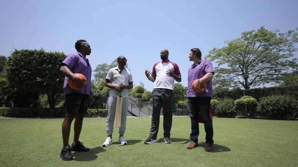 Shane Watson and Dwayne Bravo interact with NBA legends Isiah Thomas and DeMarcus Cousins during a Kolkata Knight Riders meet-and-greet event.