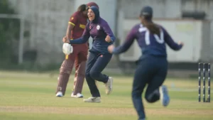 Scotland Women cricketer Abtaha Maqsood celebrates taking a wicket during an international match against West Indies Women.