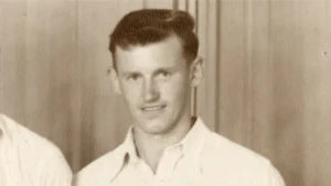Vintage portrait of former New Zealand cricketer Bob Blair wearing a white cricket shirt.