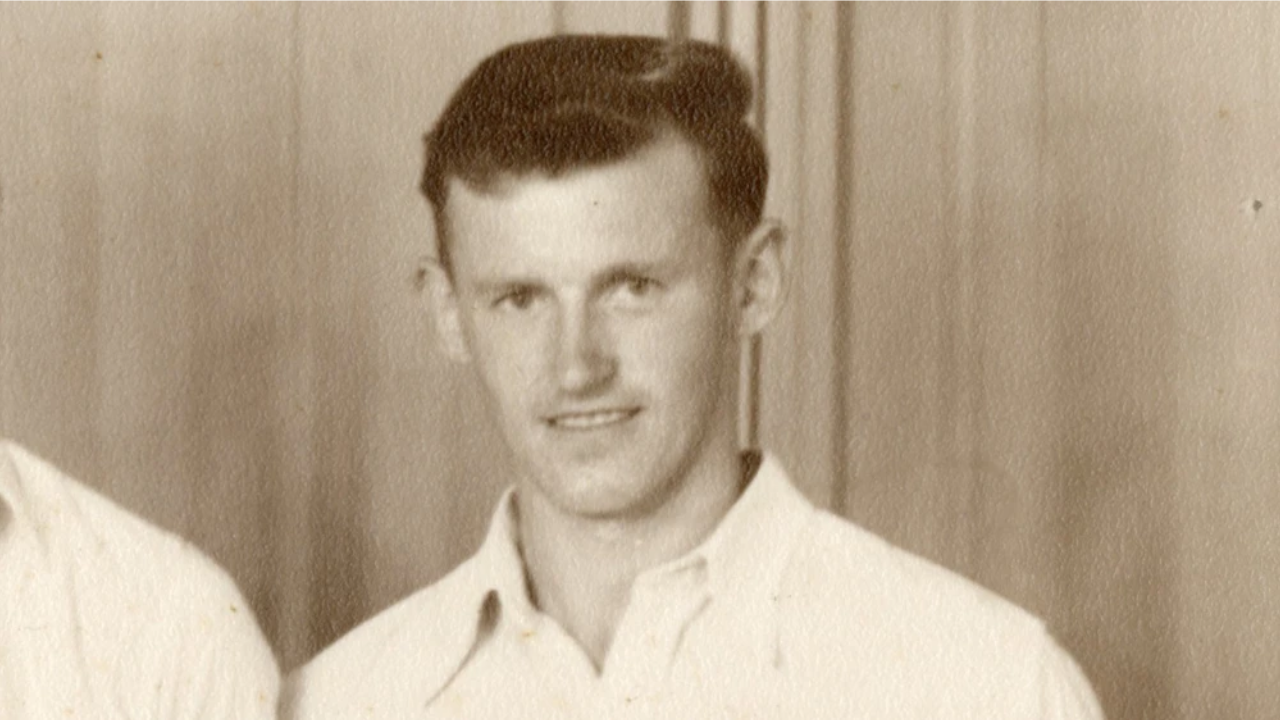 Vintage portrait of former New Zealand cricketer Bob Blair wearing a white cricket shirt.