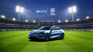 BYD electric vehicle displayed on a cricket field under stadium floodlights as part of the Caribbean Premier League sponsorship and partnership announcement.