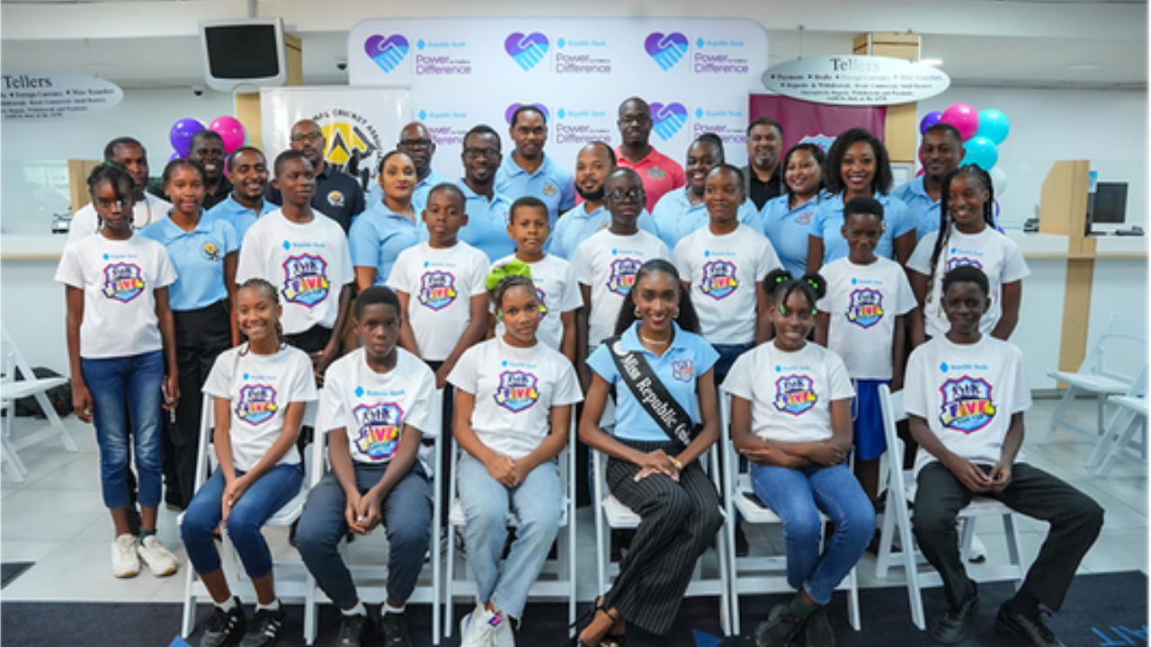Participants, coaches, and organizers pose for a group photo during Cricket West Indies' Five for Fun youth cricket programme and community engagement initiative.