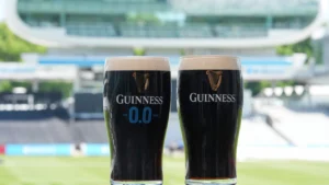 Pints of Guinness and Guinness 0.0 displayed overlooking Lord's Cricket Ground, highlighting the brand's presence at the iconic cricket venue.