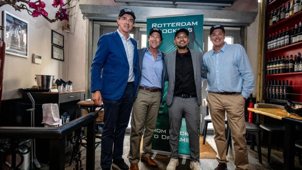KNCB CEO Huib van Walsem, Jonty Rhodes, Shree, and KNCB Director of High Performance Roland Lefebvre pose together at a Rotterdam Dockers event in the Netherlands.