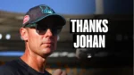Portrait of Johan Botha wearing sunglasses and a team cap, featured in a tribute graphic with the text “Thanks Johan” recognizing his contribution to cricket.