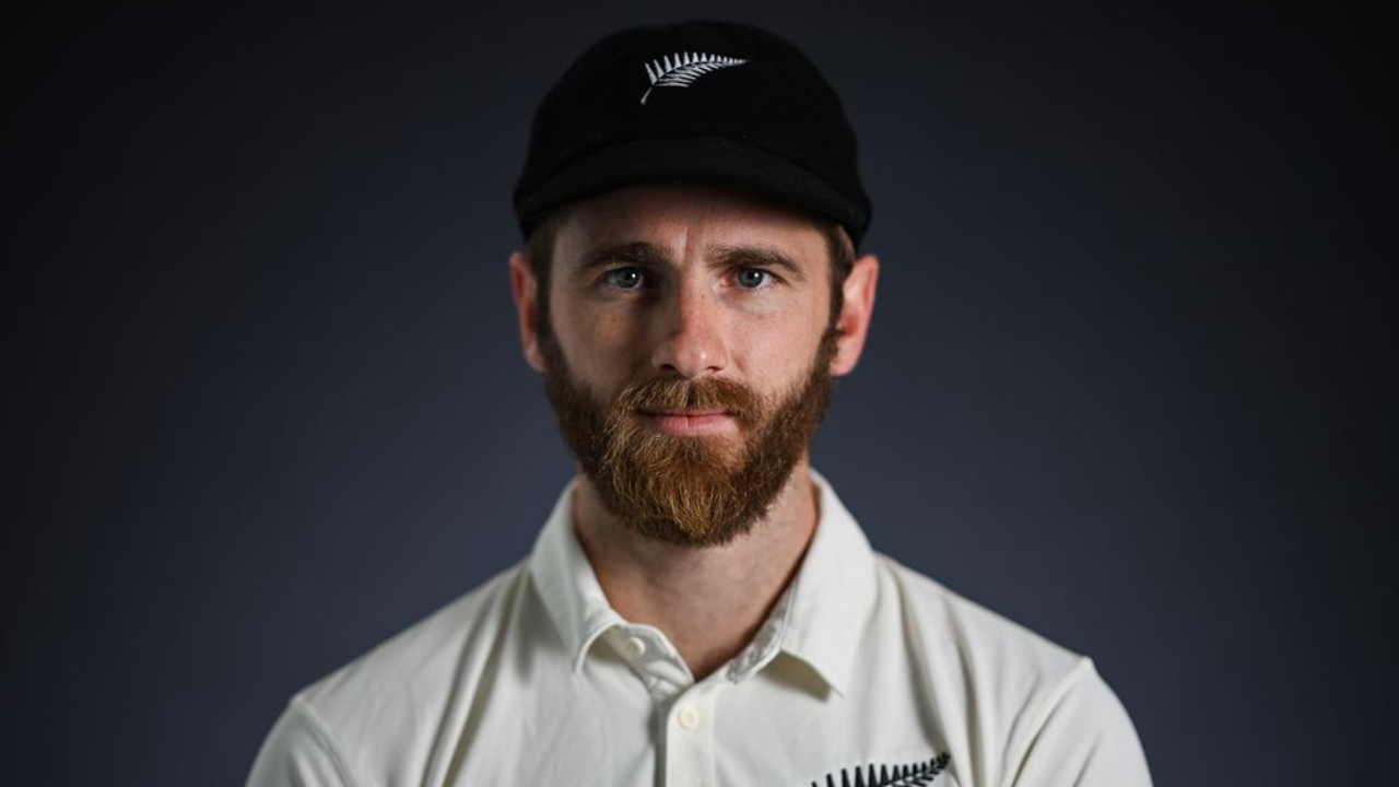 Kane Williamson poses for an official portrait wearing New Zealand cricket team apparel and cap ahead of an international cricket tournament.