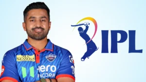 Karun Nair in a Delhi Capitals jersey alongside the IPL logo, representing his involvement in the Indian Premier League cricket competition.